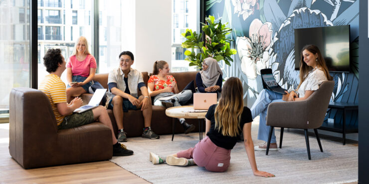 Students are lounging in the foyer of St Catherine's College Student Accommodation